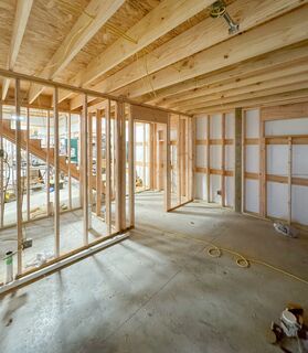 Finished basement with home theater and bar area