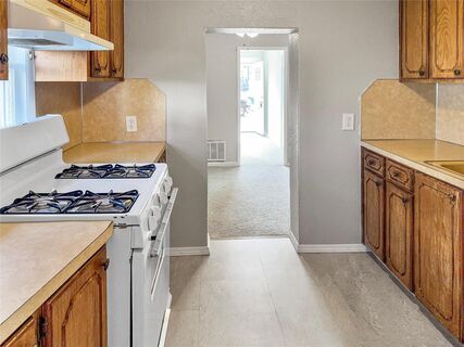 Modern kitchen remodel with white shaker cabinets