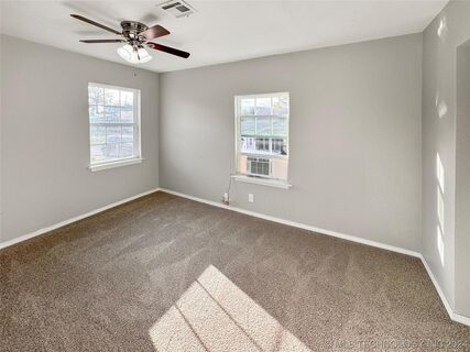 Elegant home office with built-in shelving